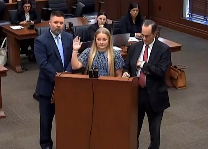 Cheerleader Laken Snelling takes the stand, prepared to confess about her newborn found hidden in a closet. Cheerleader Laken Snelling takes the stand, prepared to confess about her newborn found hidden in a closet.