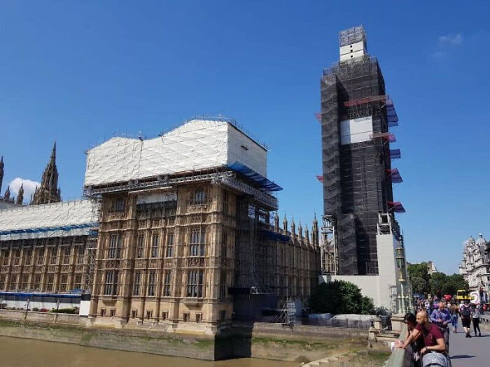 Big Ben and the Houses of Parliament covered in scaffolding and tarps, a common sight on people's trips that didn't go as planned.