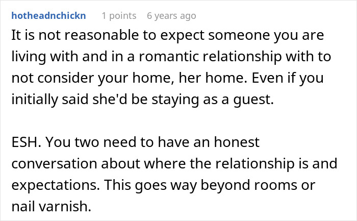 A screenshot of a Reddit comment discussing relationship expectations and boundaries when a woman moves into a guy's house.