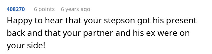 A Reddit comment expressing happiness that the stepson received his present back and that his parents are on the person's side, regarding buying stepson's love.