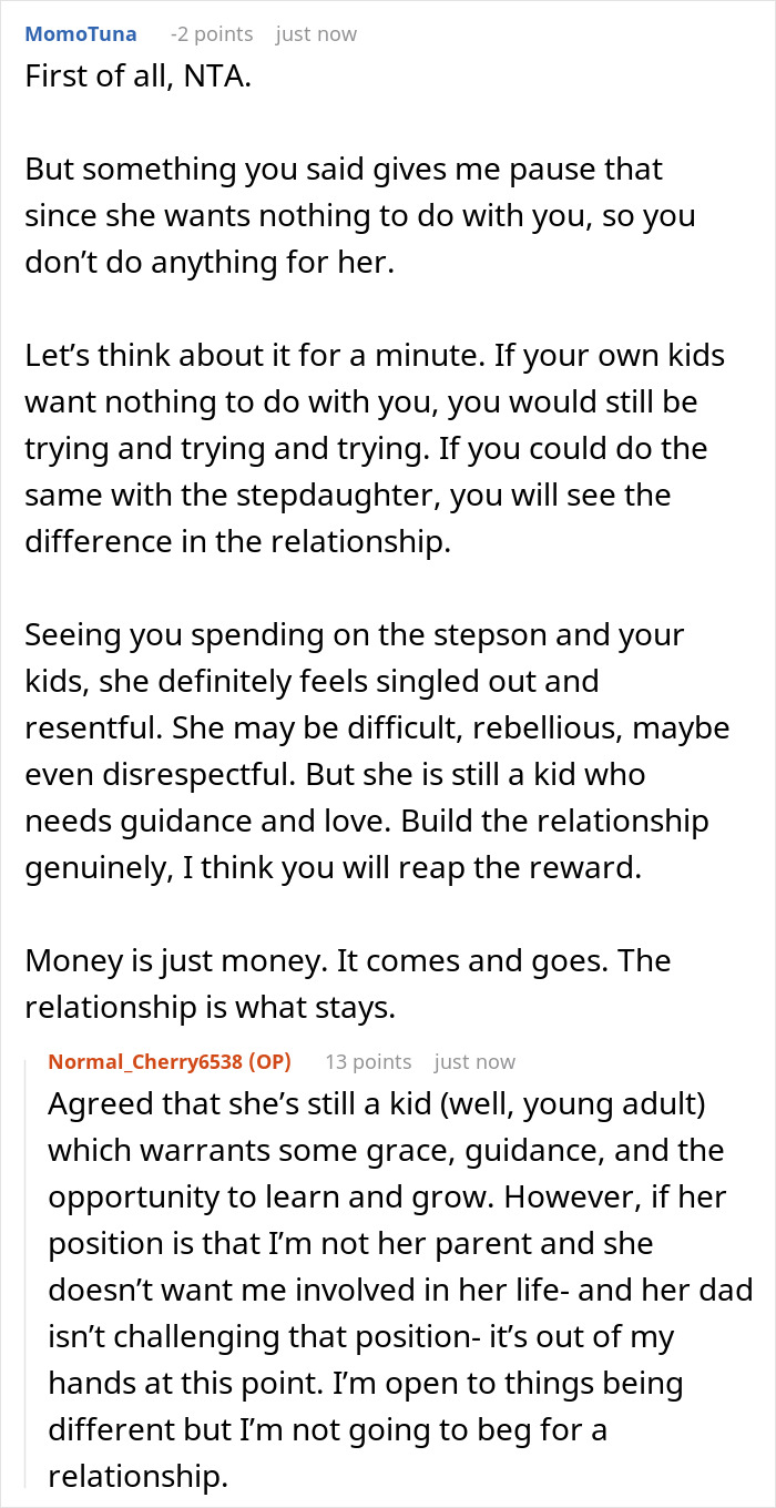 A Reddit comment suggesting the mom build a genuine relationship with her stepdaughter despite her refusing to fund his kids. A Reddit comment suggesting the mom build a genuine relationship with her stepdaughter despite her refusing to fund his kids.
