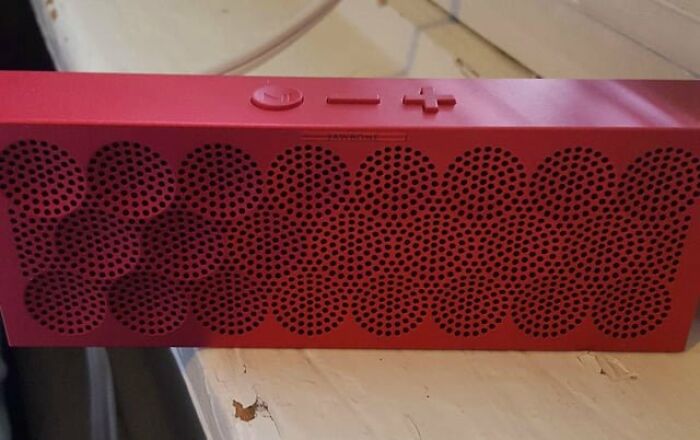A red portable speaker, representing a product from a company that faced ultimate ruin.