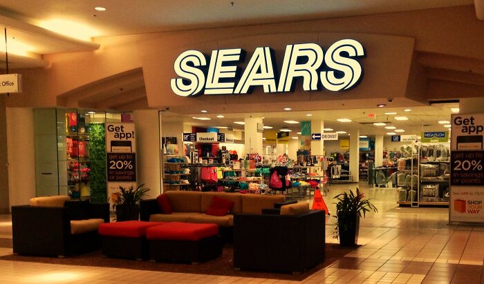The entrance to a Sears department store, an example of companies that used to dominate the market.
