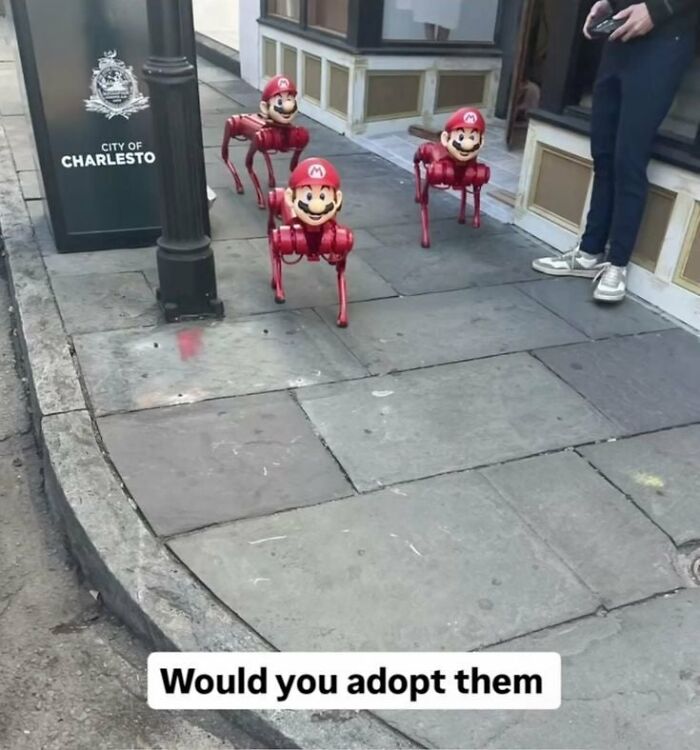 Three robot Marios on leashes, being walked down a city sidewalk, a funny example of dumb people on the internet.