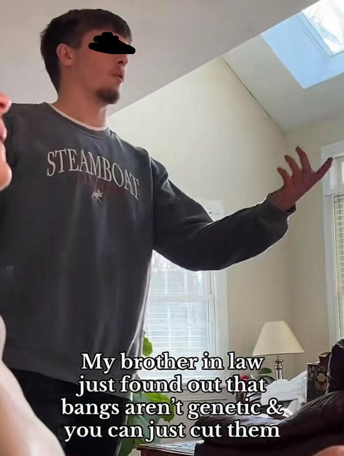 A man learning bangs arent genetic, showcasing something dumb people just found out.