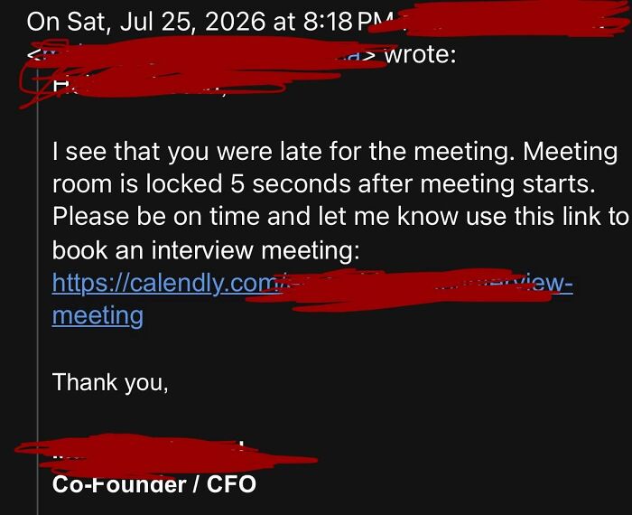 An email displaying corporate absurdity, showing a late notice for a meeting and a link to reschedule, exemplifying the absurdity of corporate time management.