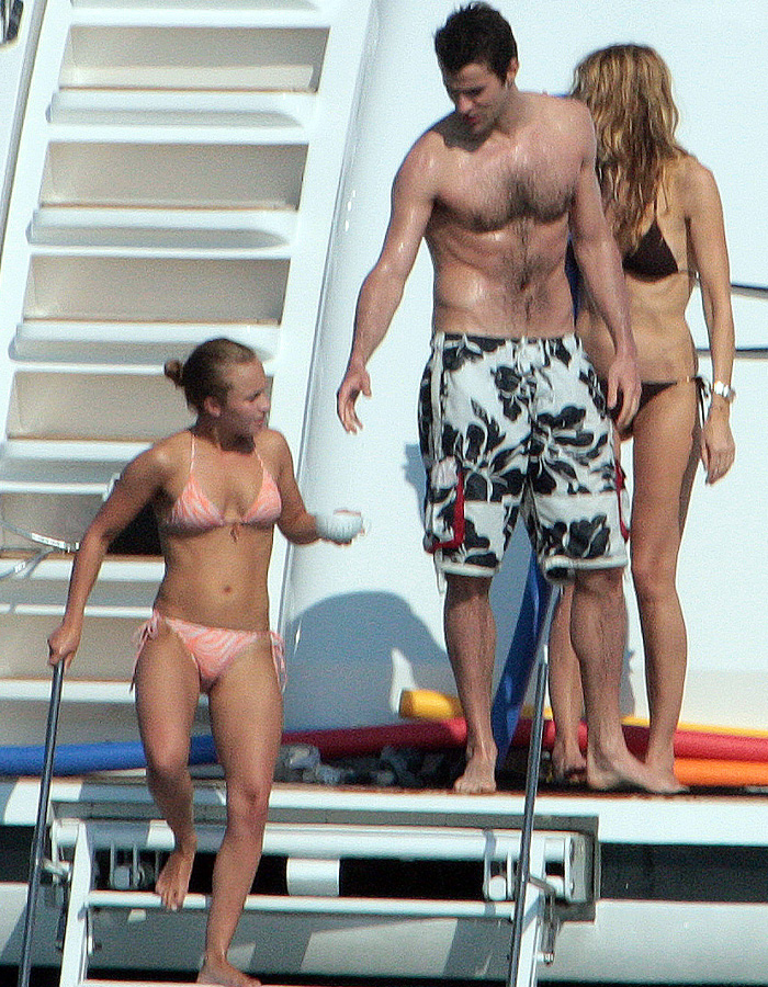 Hayden Panettiere in a bikini, enjoying a yacht outing; her memoir shares disturbing revelations.