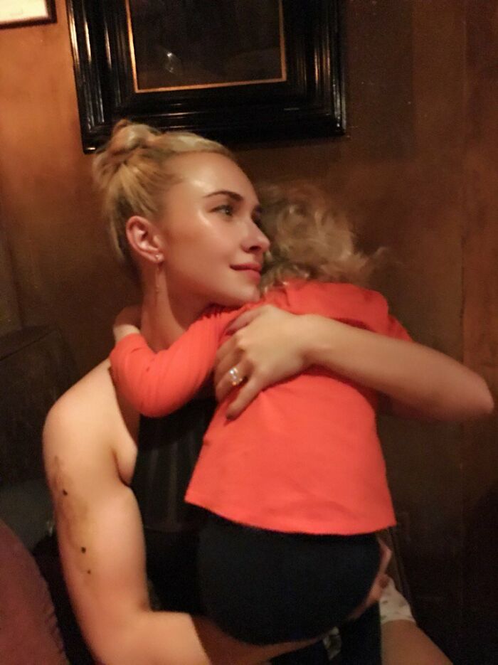Hayden Panettiere embraces a child, reflecting on her memoir and birthday.