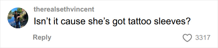 A user questions if Dolly Parton's skin-colored gloves are actually tattoo sleeves covering tattooed hands. A user questions if Dolly Parton's skin-colored gloves are actually tattoo sleeves covering tattooed hands.