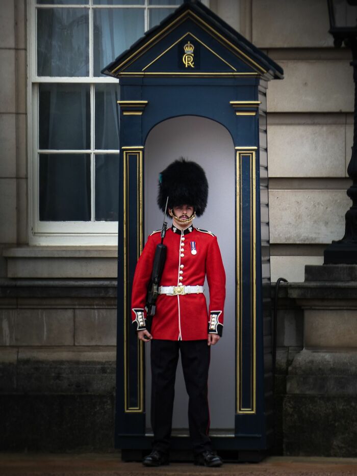 A British royal guard on duty, representing the culture and respect Americans should show when visiting other countries.