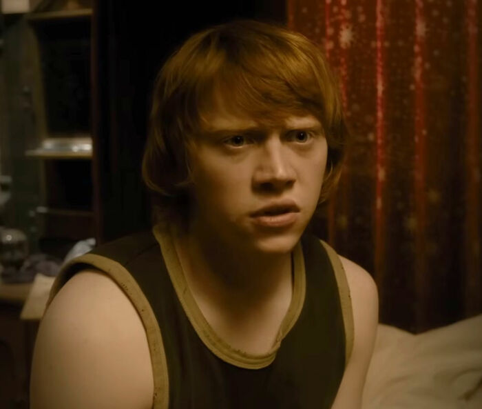 Rupert Grint as his Harry Potter character, looking surprised or concerned in a still from the film. Rupert Grint as his Harry Potter character, looking surprised or concerned in a still from the film.
