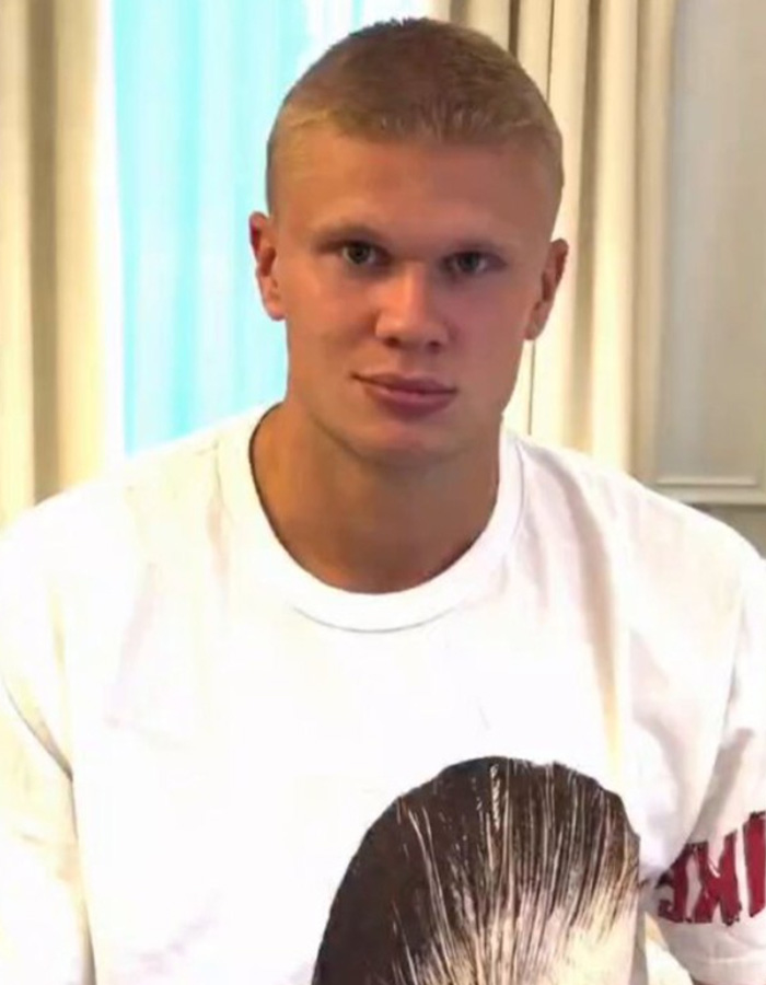 Erling Haaland's drastic new haircut: a blond buzz cut. Erling Haaland's drastic new haircut: a blond buzz cut.