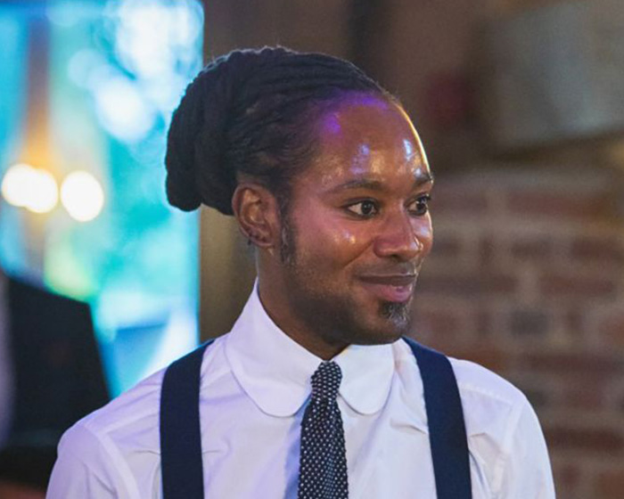 An ex-Cambridge professor looking right, dressed in a white shirt and suspenders, embroiled in the PhD plagiarism scandal. An ex-Cambridge professor looking right, dressed in a white shirt and suspenders, embroiled in the PhD plagiarism scandal.