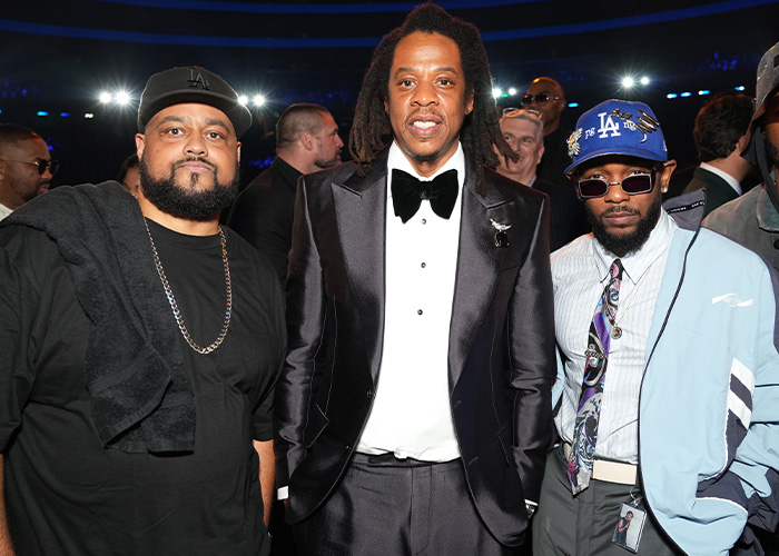 Jay-Z and two other men on the red carpet. Learn about these famous men who are shorter than you think.