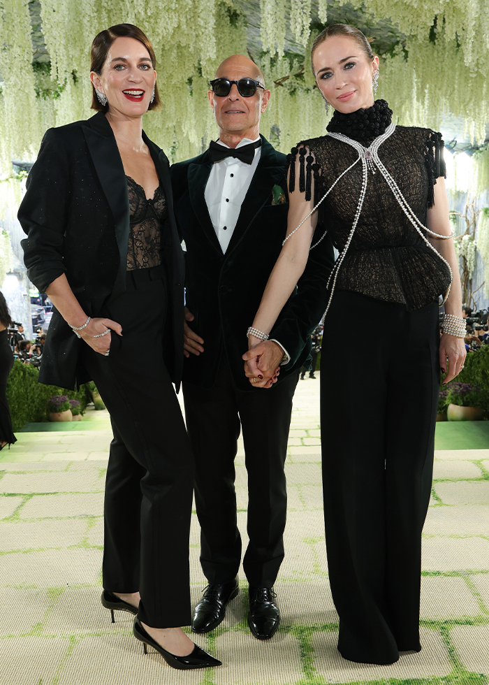 Stanley Tucci, an actor and one of the famous men who are shorter than fans might think, poses with his wife and Emily Blunt.