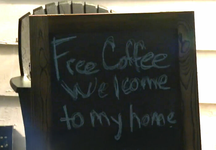 A sign offering free coffee, welcoming people to a Missouri grandma's home for free breakfasts. A sign offering free coffee, welcoming people to a Missouri grandma's home for free breakfasts.