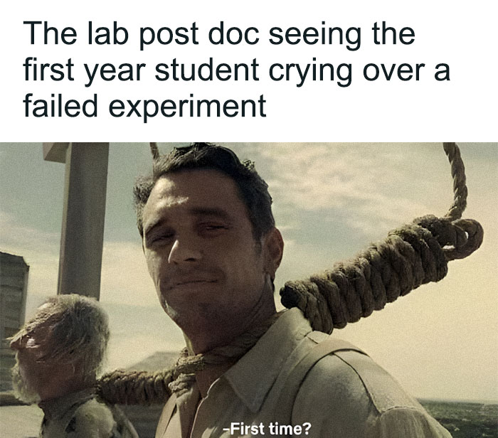 A PhD meme shows a man with a noose around his neck asking, First time? to a crying student, relating to PhD life.