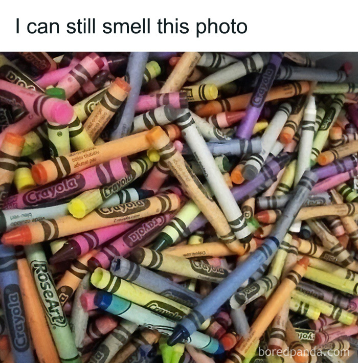 A pile of colorful used Crayola crayons, evoking the magic of the 90s and 00s.