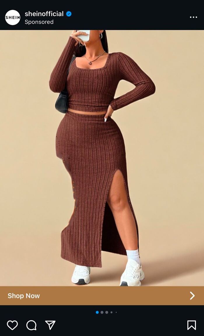 Woman in a poorly fitted ribbed brown two-piece set with a high slit, a bad fashion crime.