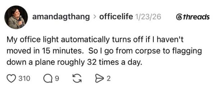 A Threads post about office life and the absurdity of having a job, describing lights turning off.