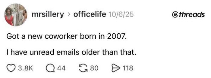 A social media post about having a job, humorously noting a coworker born in 2007, younger than unread emails.