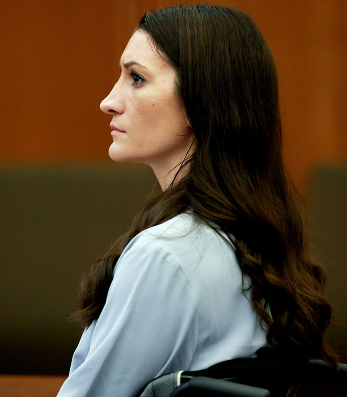 Lindsay Clancy, the subject of the Green Dress Lady viral video, sits in profile during her trial. Lindsay Clancy, the subject of the Green Dress Lady viral video, sits in profile during her trial.