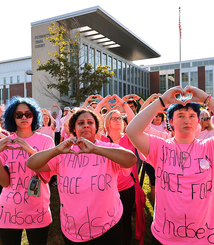 Supporters for Lindsay Clancy form hearts with their hands outside the Plymouth Trial Court. Supporters for Lindsay Clancy form hearts with their hands outside the Plymouth Trial Court.