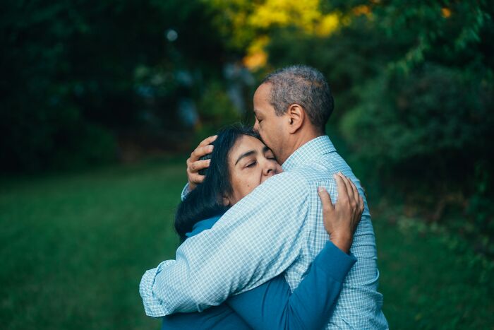 A loving couple embracing outdoors, depicting the truths of being married.