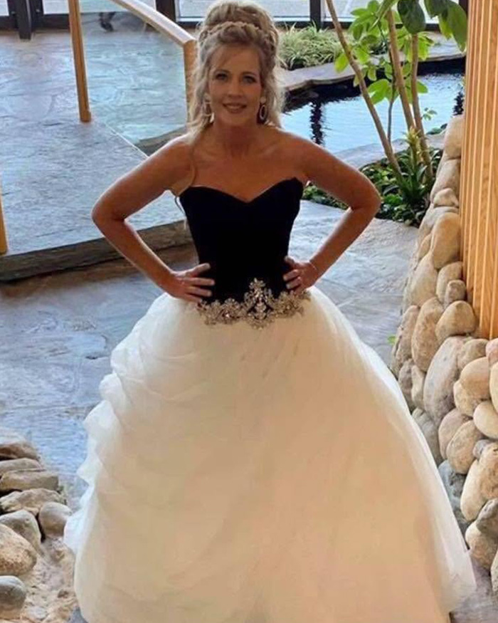 Hair salon owner in a black and white gown. Hair salon owner learns fate after telling transgender customers to go to a pet groomer. Hair salon owner in a black and white gown. Hair salon owner learns fate after telling transgender customers to go to a pet groomer.