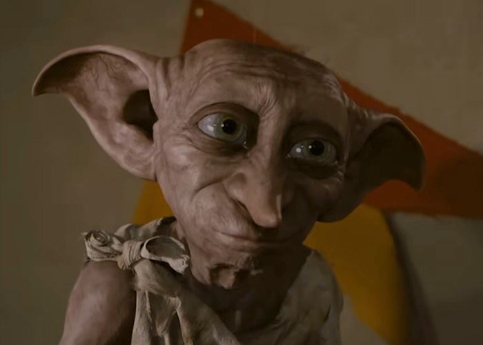 A close-up of Dobby, a beloved Harry Potter character, with his large eyes and ears. Harry Potter fans will recognize this iconic house-elf.