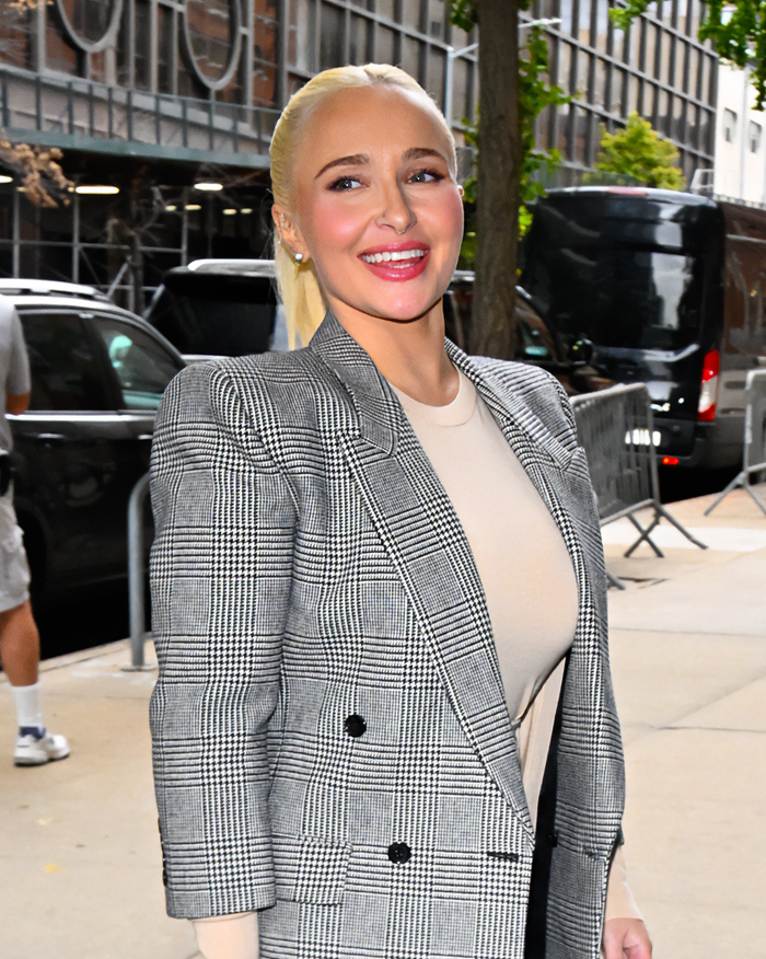 Hayden Panettiere smiling, wearing a plaid blazer, for tragic passing news. Hayden Panettiere smiling, wearing a plaid blazer, for tragic passing news.