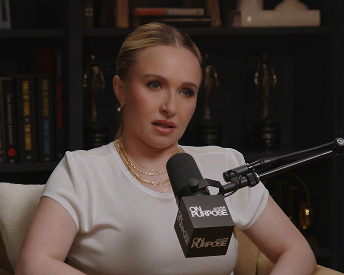 Hayden Panettiere speaking into a microphone, serious expression. Fans note recent revelation. Hayden Panettiere speaking into a microphone, serious expression. Fans note recent revelation.