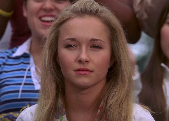 Hayden Panettiere looking serious, with long blonde hair, sparking a dark theory about her passing. Hayden Panettiere looking serious, with long blonde hair, sparking a dark theory about her passing.