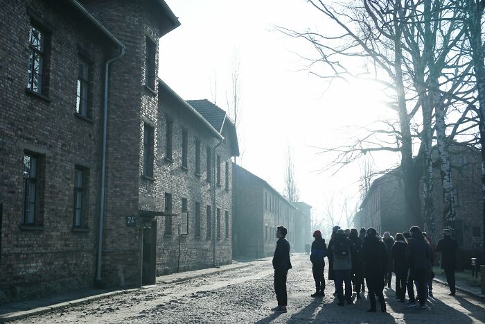 A group of people touring a historical site, illustrating funny encounters with American tourists.