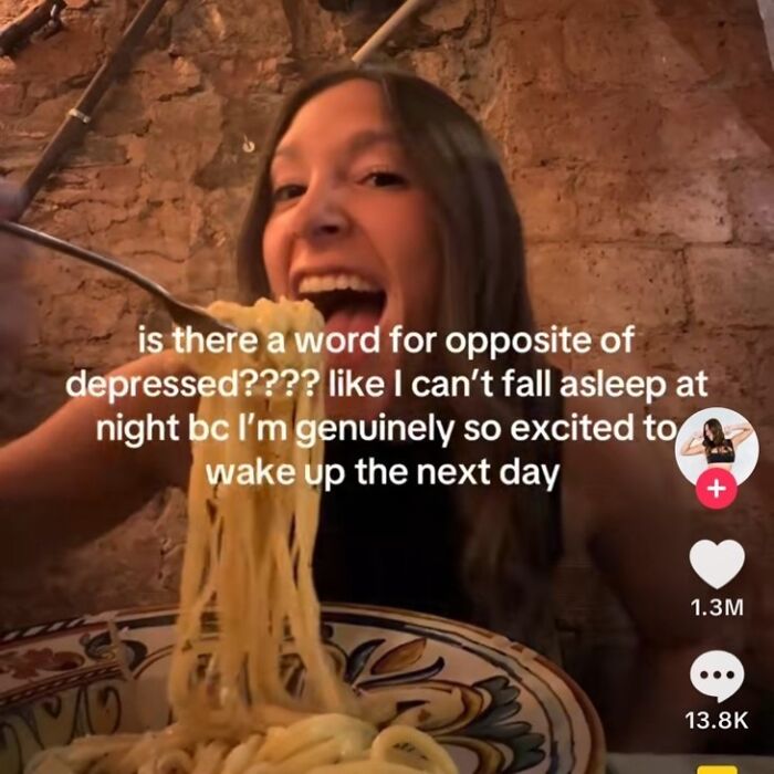 A woman eating a large forkful of pasta, with text about not being able to sleep from excitement, for funny memes.
