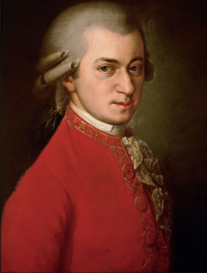 A portrait of Wolfgang Amadeus Mozart in a red jacket, an image people are weirdly invested in.