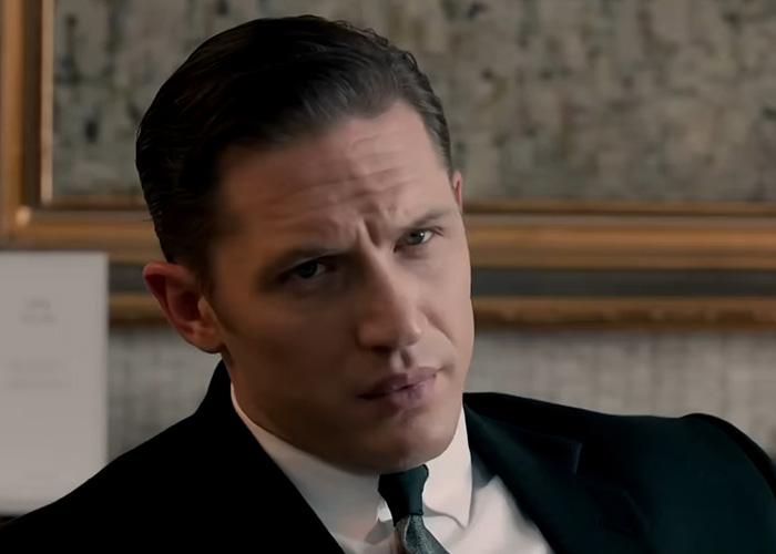 A Hollywood star with sleek hair and a stern expression, exposing self-loathing behind his physique. A Hollywood star with sleek hair and a stern expression, exposing self-loathing behind his physique.