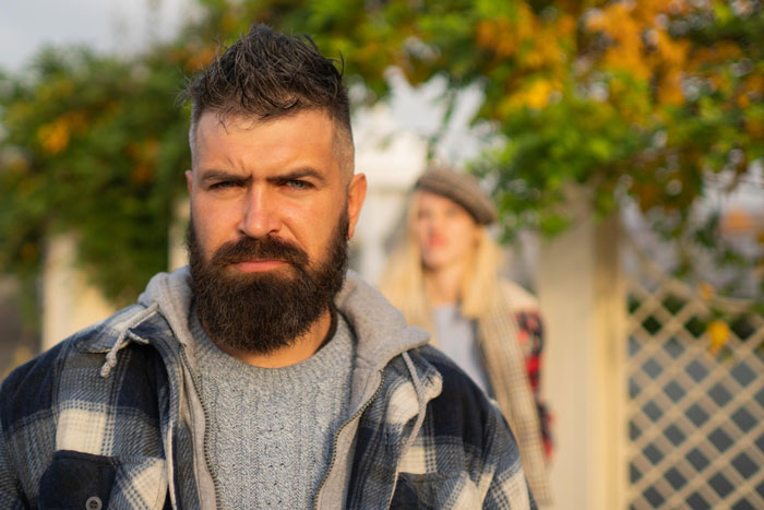 A man with a beard, symbolizing the guy who buys a hot tub, looks upset. A man with a beard, symbolizing the guy who buys a hot tub, looks upset.