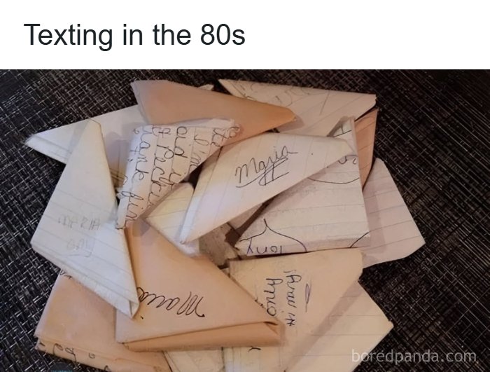 A pile of folded paper notes, representing texting in the 80s and reminding us of good times.