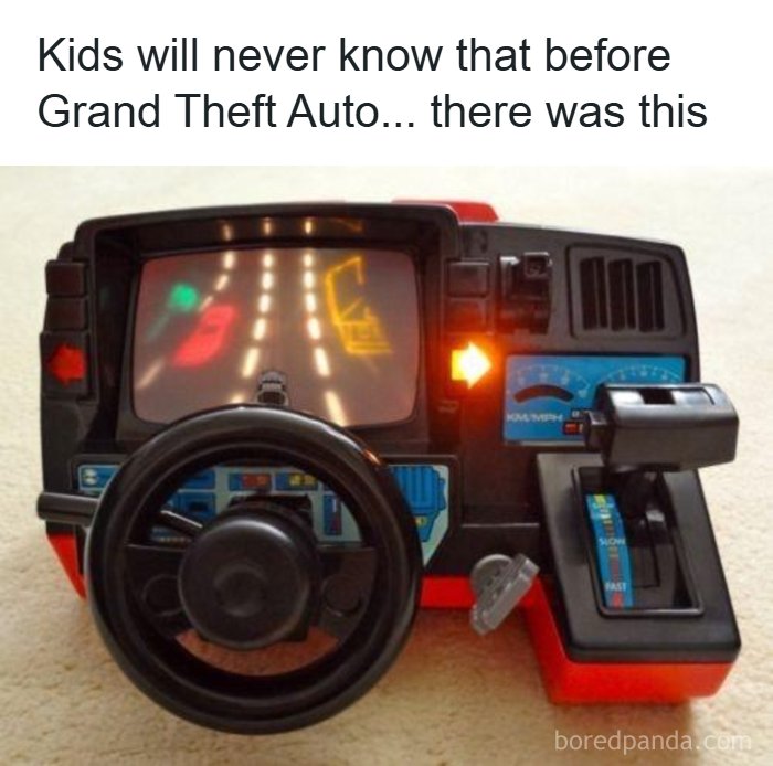 A vintage red and black driving video game, a classic toy from the good time of the 80s.