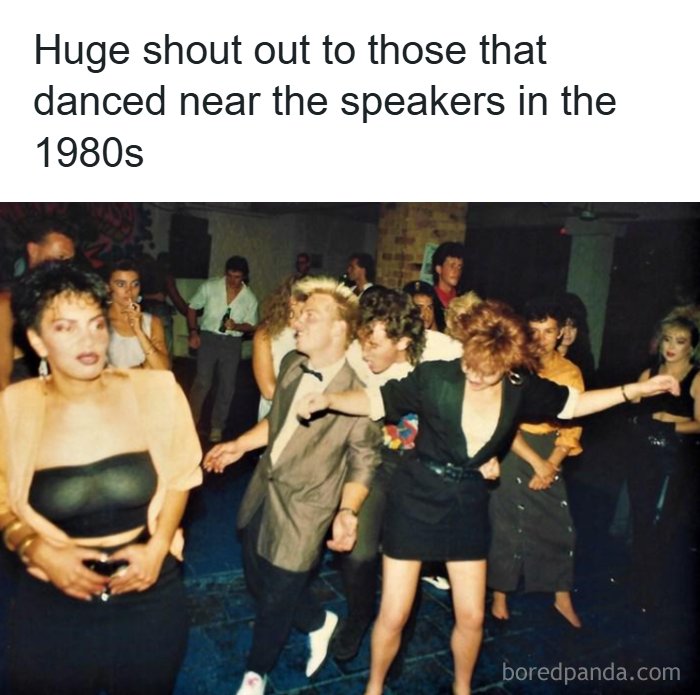 A group of people dancing enthusiastically at a party in the 80s, reminiscing about the good time.
