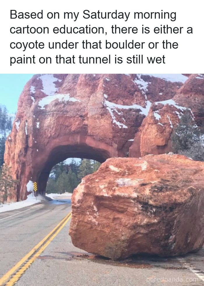 A large boulder blocking a road next to a rock tunnel, a scene that reminds of '80s cartoons and how old you become.
