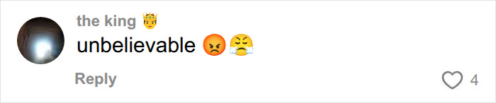 A social media comment expressing anger with emoticons, discussing the ban of dog breeds in the UK. A social media comment expressing anger with emoticons, discussing the ban of dog breeds in the UK.