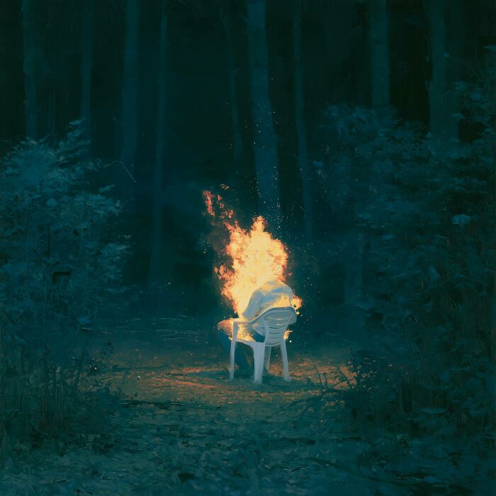 A surreal work by Luca Ponsato with a figure on fire on a chair in a dark forest, exploring human emotions.
