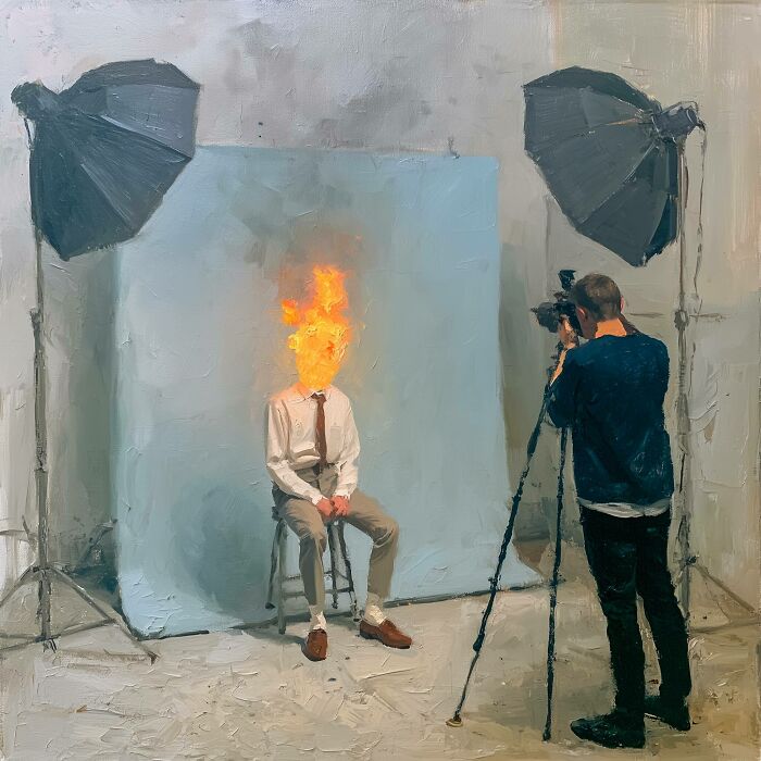 A surreal work by Luca Ponsato featuring a man with a flaming head being photographed in a studio, exploring human emotions.