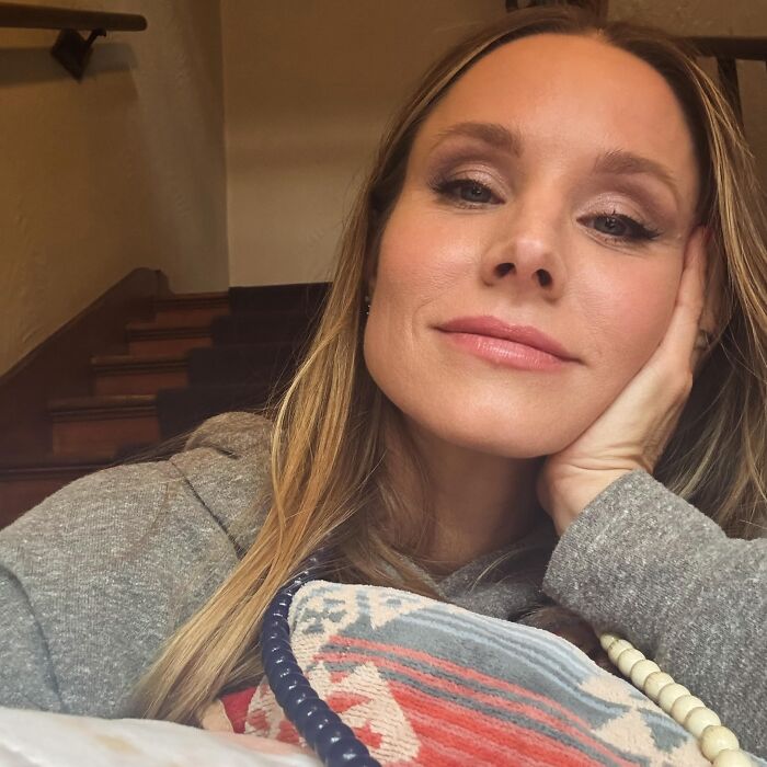 Kristen Bell relaxing, sharing insights on the realities of dating a celebrity.