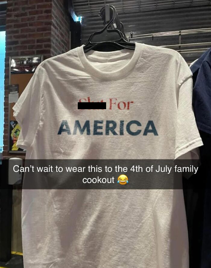 A bizarre T-shirts on a hanger that says FOR AMERICA, brilliant and unhinged.