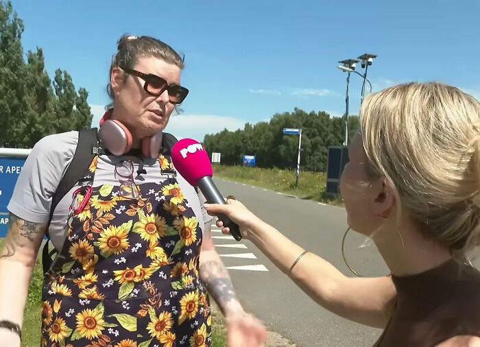 A Trans American recounts horrors after fleeing US for European asylum center, being interviewed outdoors by a reporter. A Trans American recounts horrors after fleeing US for European asylum center, being interviewed outdoors by a reporter.
