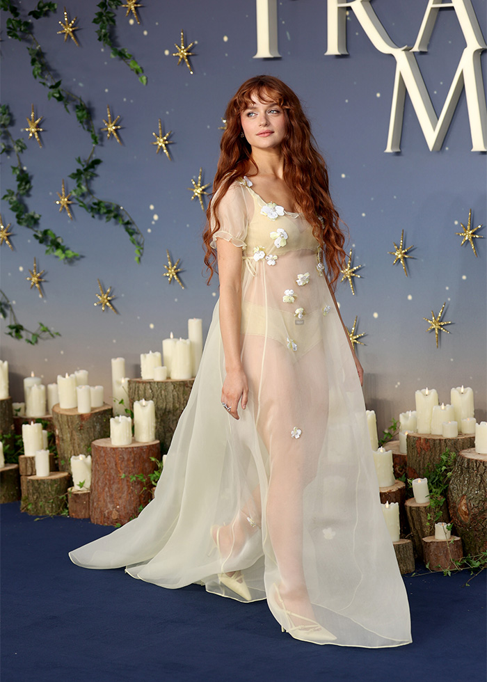 Joey King walks the red carpet at a movie premiere, revealing her underwear in a sheer gown. Joey King walks the red carpet at a movie premiere, revealing her underwear in a sheer gown.
