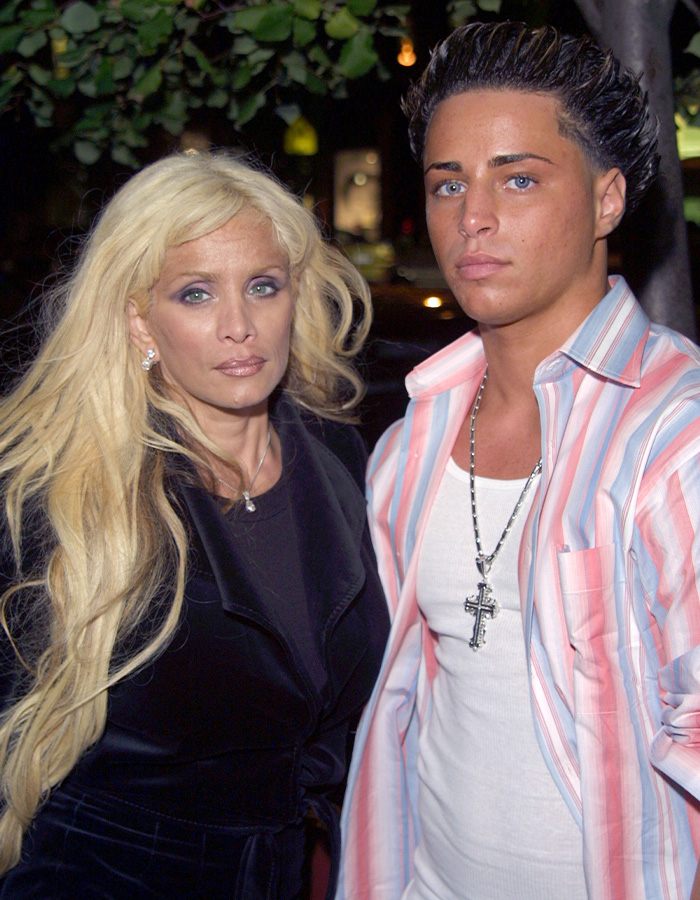 John Gotti’s grandson standing with his mom, ordered to donate kidney or go to prison. John Gotti’s grandson standing with his mom, ordered to donate kidney or go to prison.